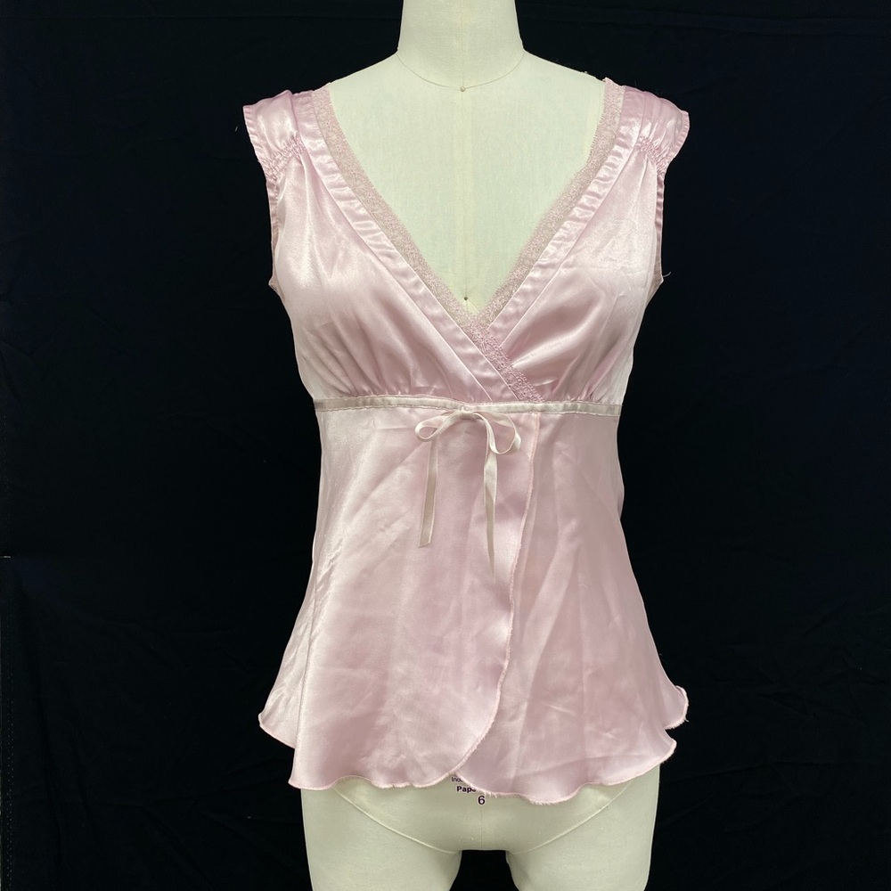Pink satin top with bow detail